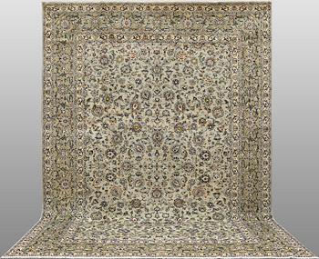 A Keshan carpet, c. 400 x 270 cm.