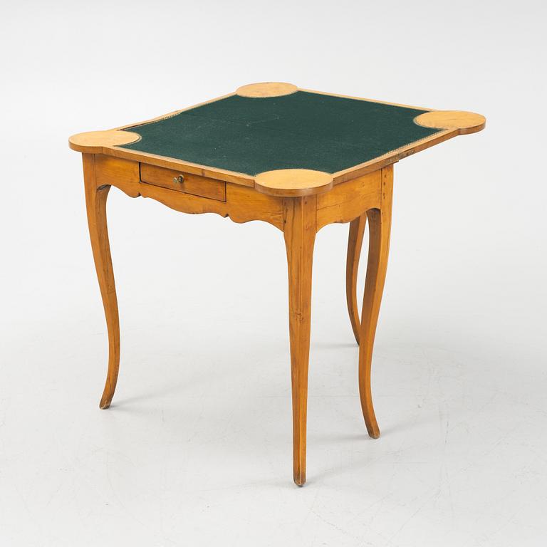 A 18th century Louis XV game table.