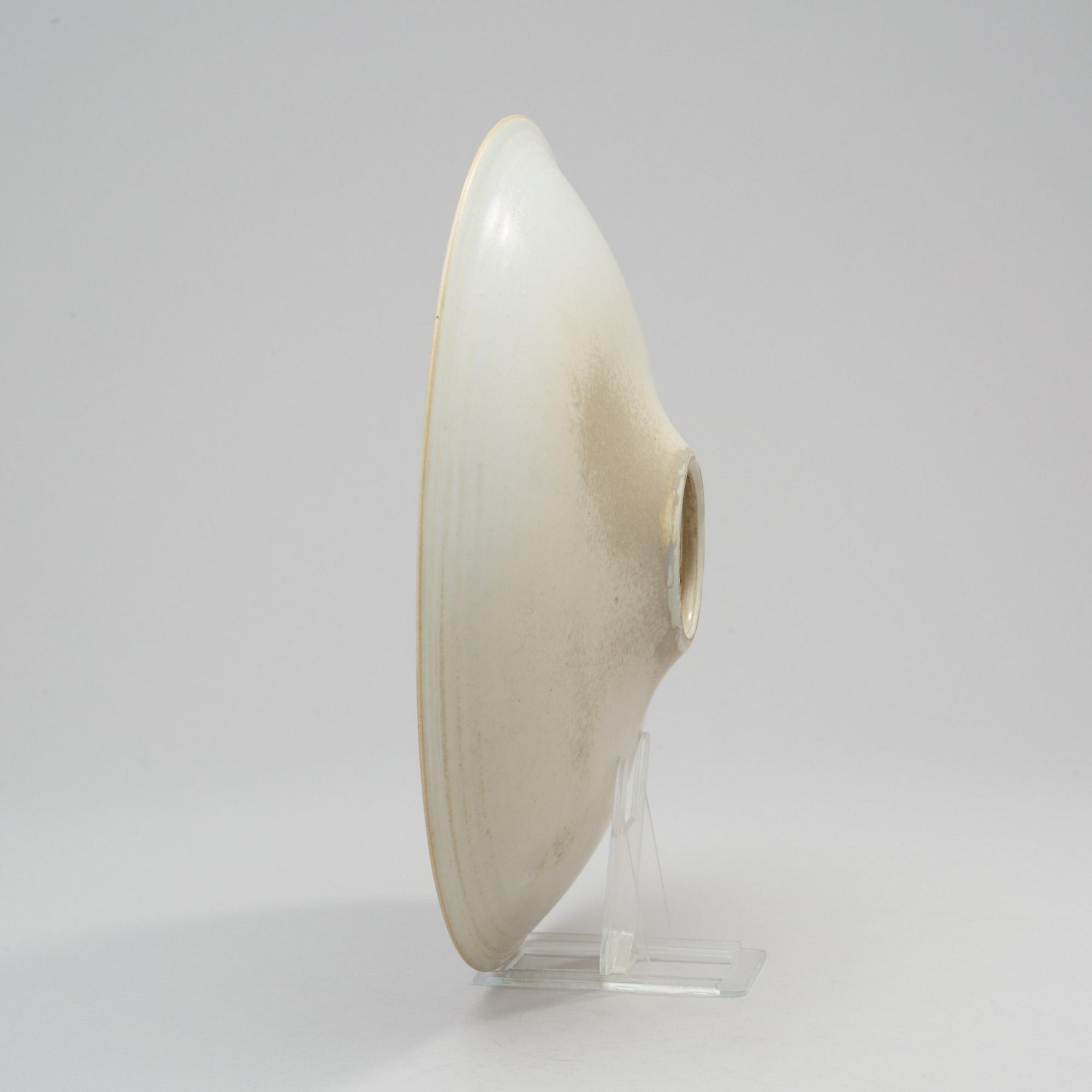 A Toini Muona stoneware dish, Arabia, Finland.