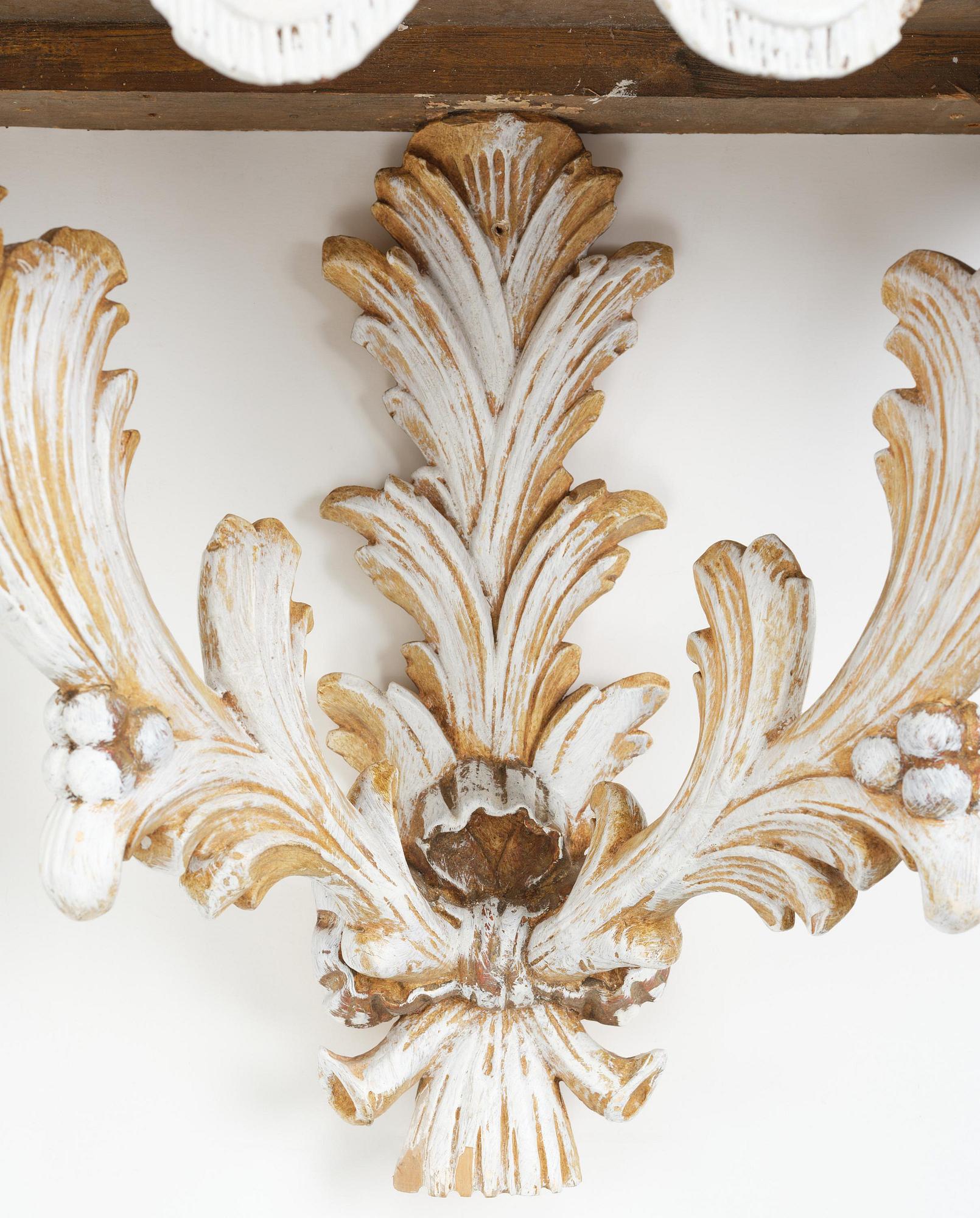 A pair of French Louis XVI-style consoles, late 19th century.