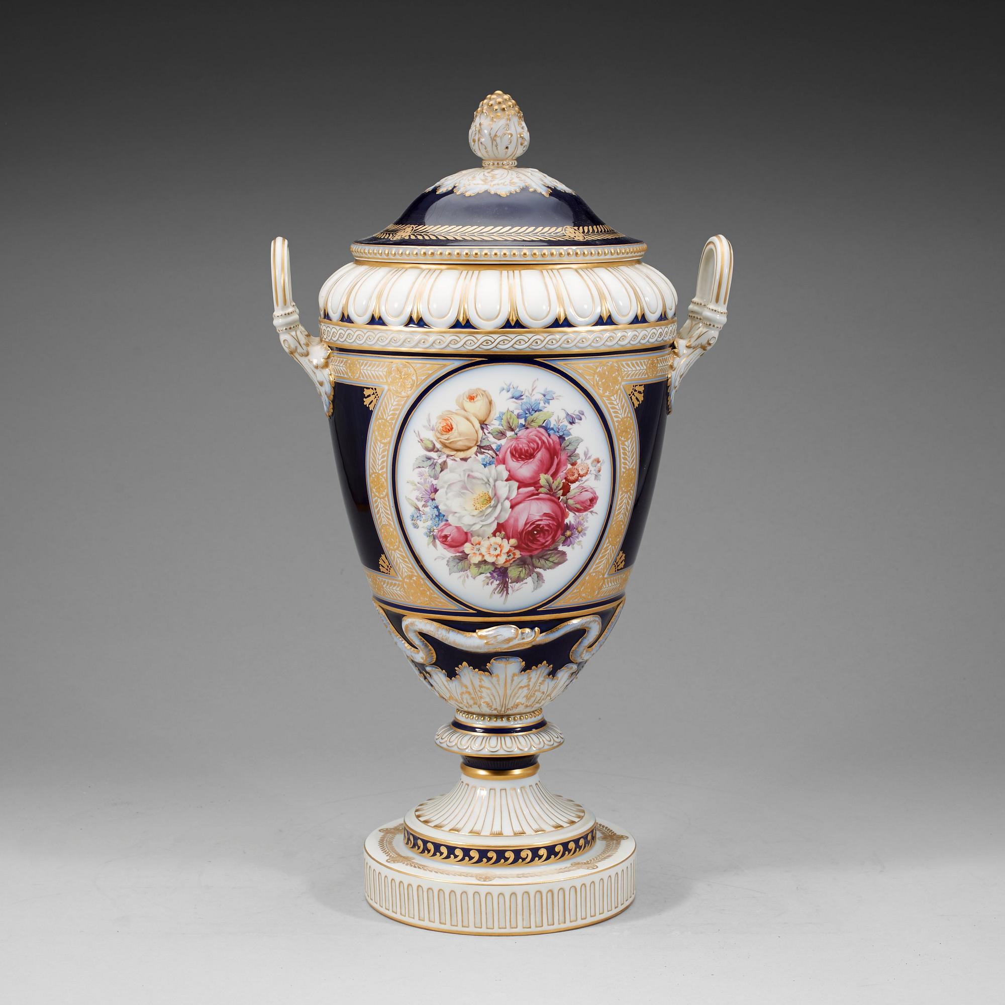 A large Berlin vase with cover, 19th Century.