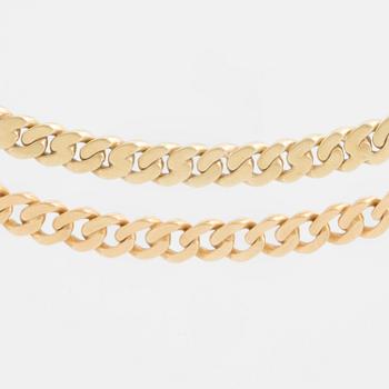A two-rowed, flattened curb-link necklace.