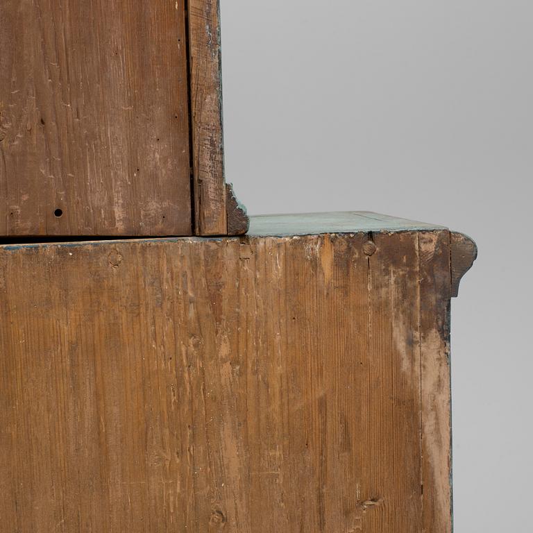 A 18th century corner cabinet.