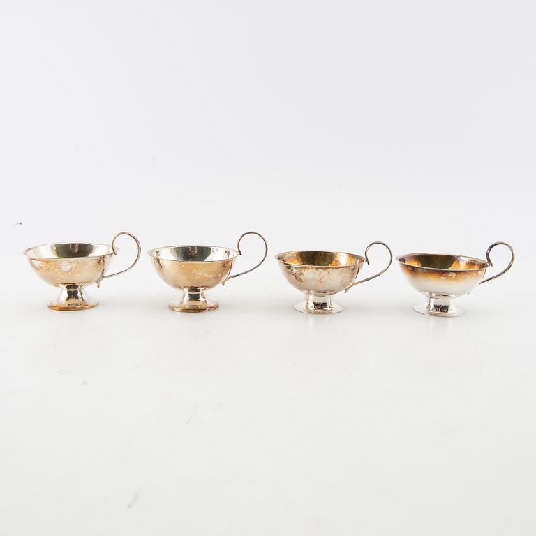 Punchmuggar, 12 st, silver, bl.a. CESONS, Göteborg 1974.