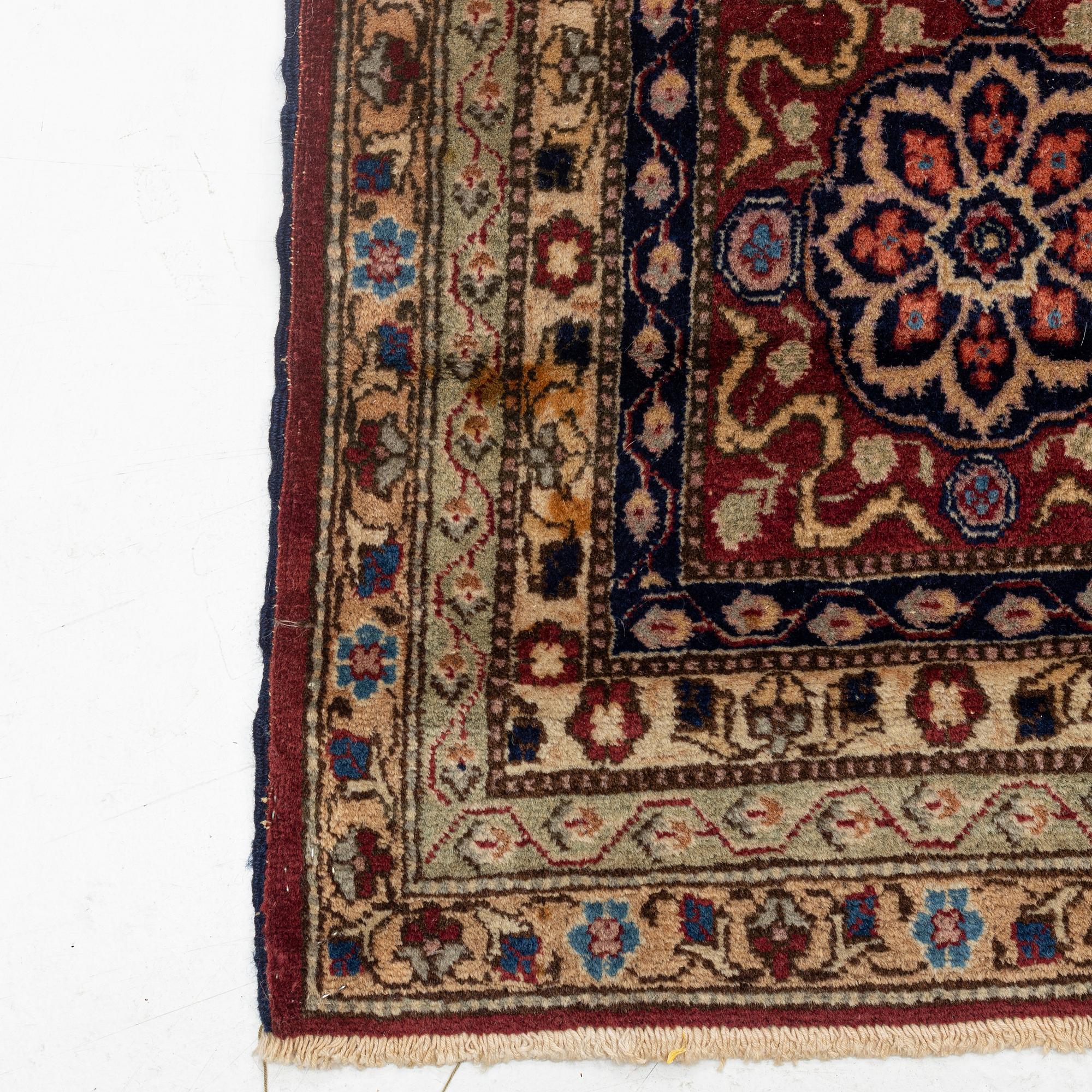 An antique Benlian Tabriz carpet, signed Jabarzade, ca 466 x 323 cm.