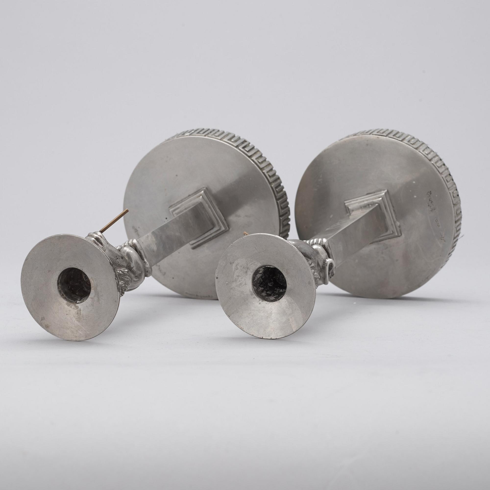 A pair of Anna Petrus pewter and brass candlesticks, Herman Bergman Konstgjuteri Stockholm ca 1923-25.