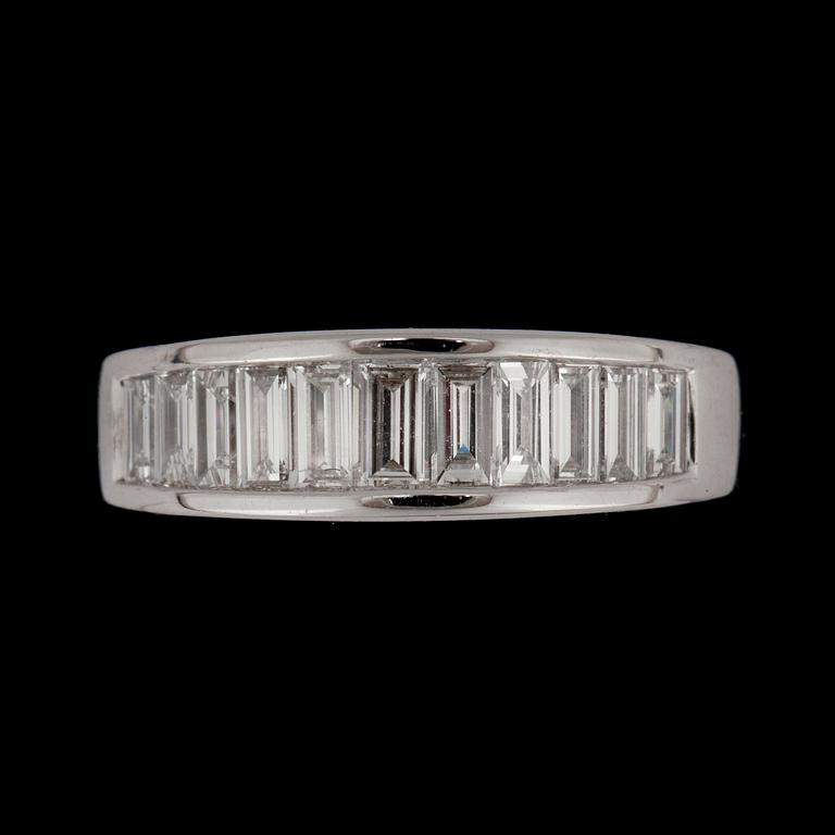 A baguette cut diamond ring, circa 0.97 ct. Quality circa H/ VS.