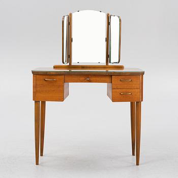 A Swedish modern teak-veneered dressing table, Fröseke, mid 20th century.