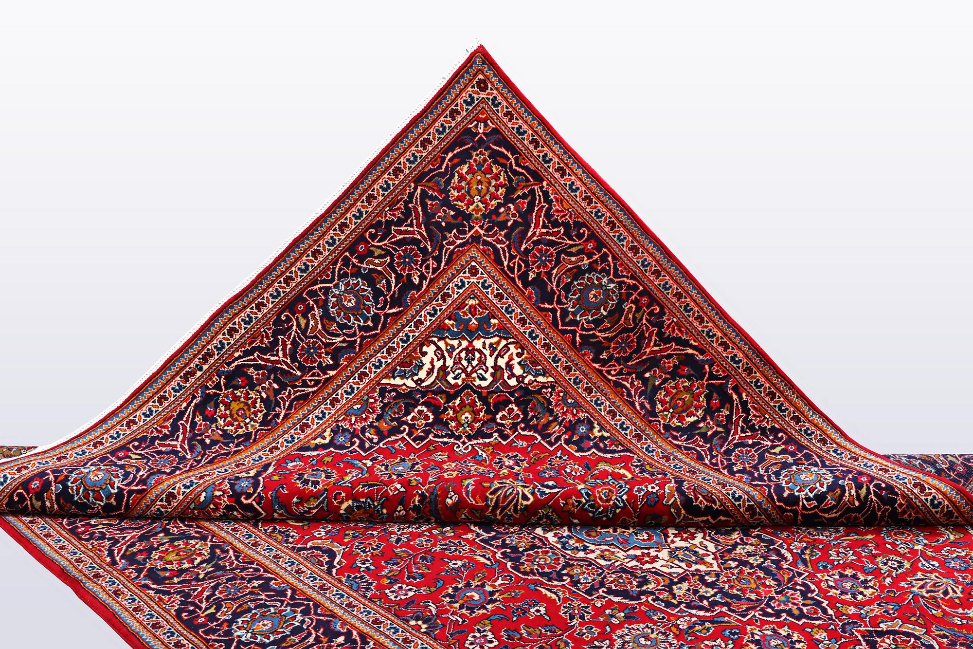A carpet, Kashan, 308 x 202 cm.