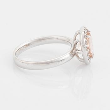 Heart shaped morganite and brilliant cut diamond ring.