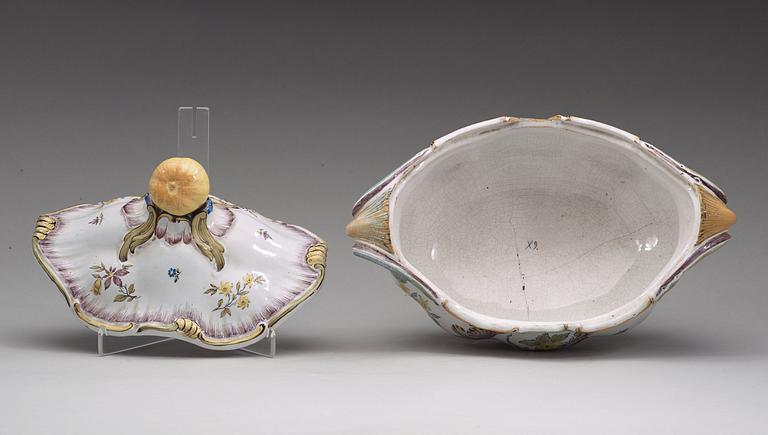 A Swedish faience tureen with cover and matched stand, Rörstrand, 18th Century.