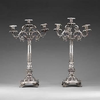 802. A pair of Swedish 19th century silver candelabras, marks of Gustaf Möllenborg, Stockholm 1838.