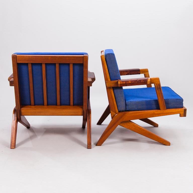 OLAVI HÄNNINEN, A 1960s 'Bumerang' armchairs for HMN Huonekalu Mikko Nupponen, Lahti, Finland.