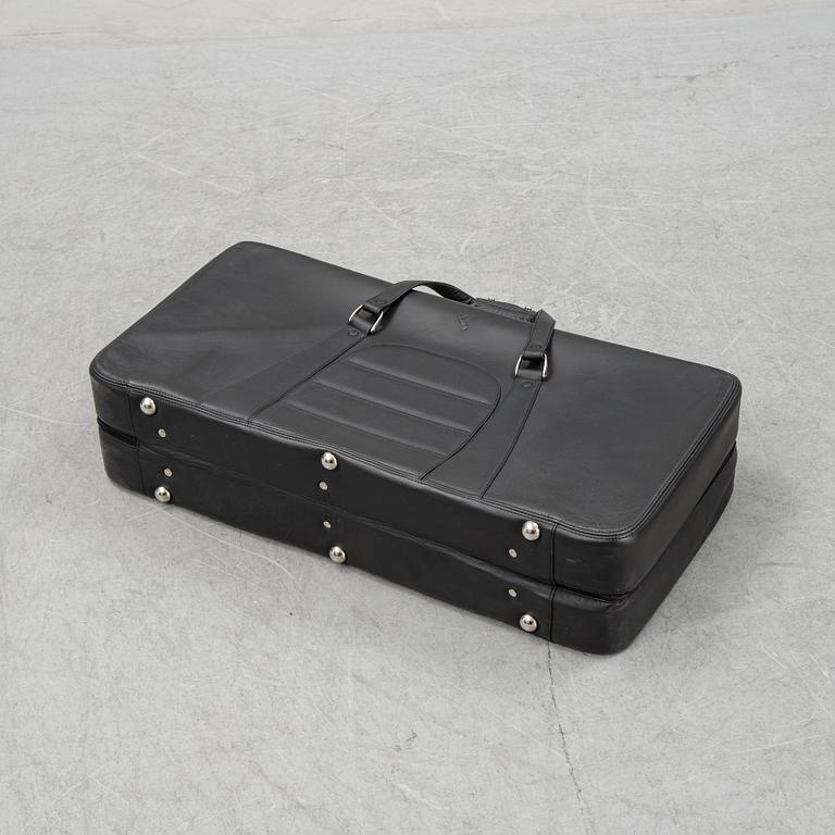 Five brack leather bags from Schedoni, Italy. For Ferrari 456.