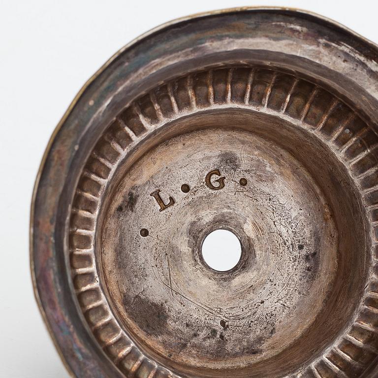 A silver plated brass Holy water bowl stamped L.G and dated 1774.