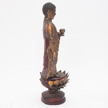 A large gilt and lacquer sculpture group, three parts, 20th century.