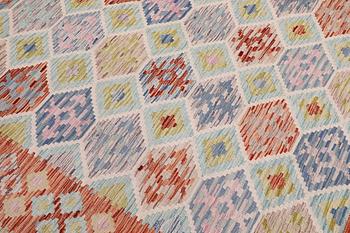 A Kilim carpet, approx. 309 x 203 cm.