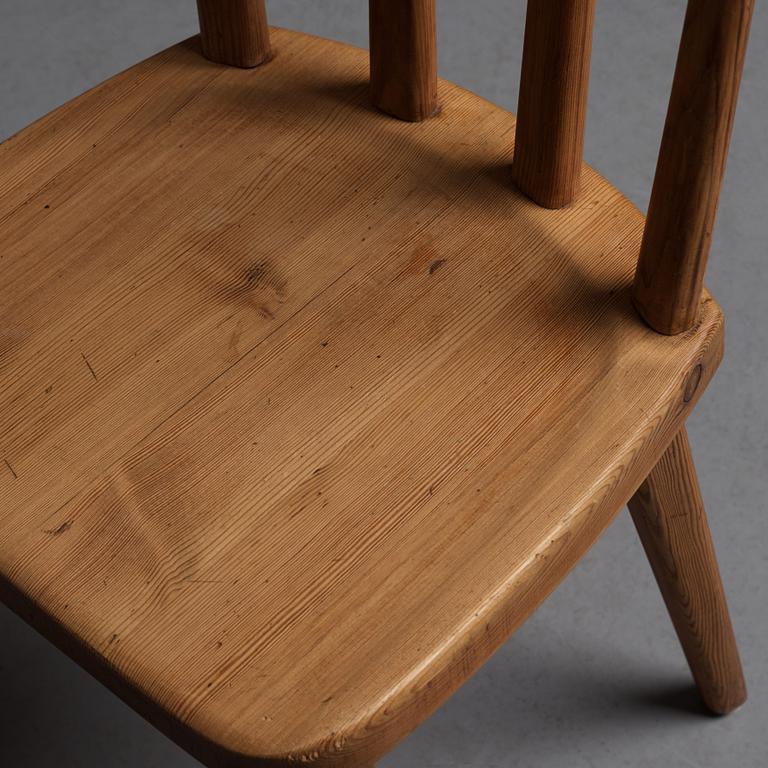 Axel Einar Hjorth, a set of six "Utö" stained pine chairs, Nordiska Kompaniet, Sweden 1930's.