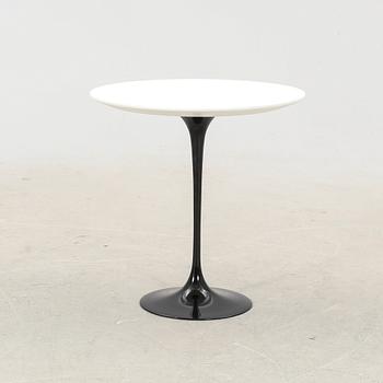 Eero Saarinen, a Tulip side table Knoll International later part of the 20th century.