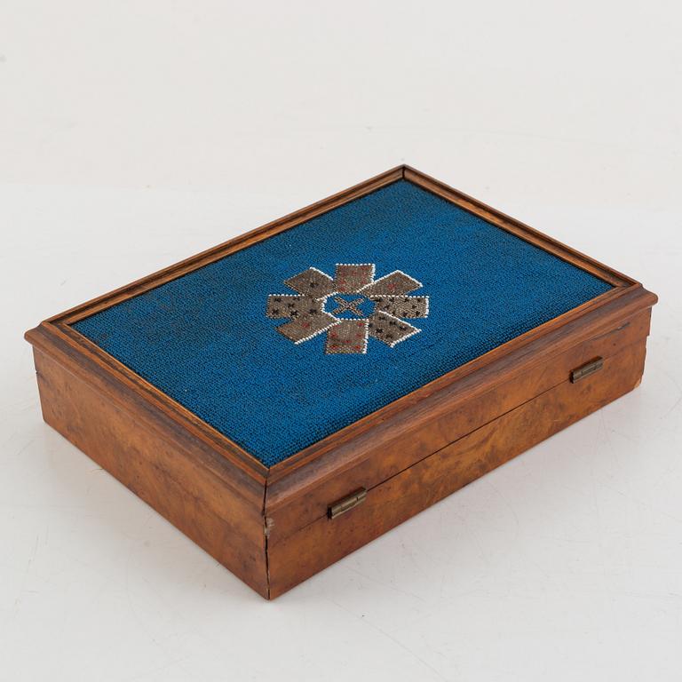 A set of six Chinese ink rubbings, two board games and a box with glass pearl embroidery.