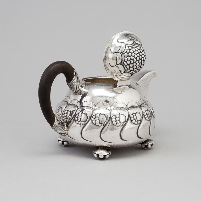 A Danish Art Nouveau silver teapot, maker's mark EVALD NIELSEN, Copenhagen, 1919.