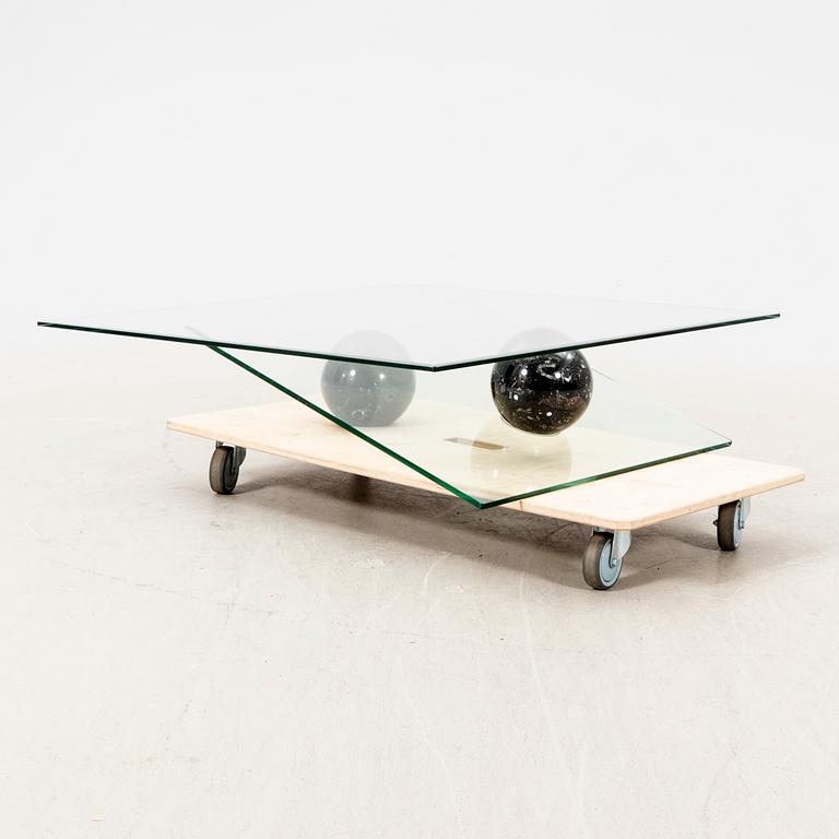 A Roche Bobois glass and marble coffee table alter part of the 20th century.