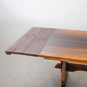 A 1940's 11 pcs dining table and chairs.