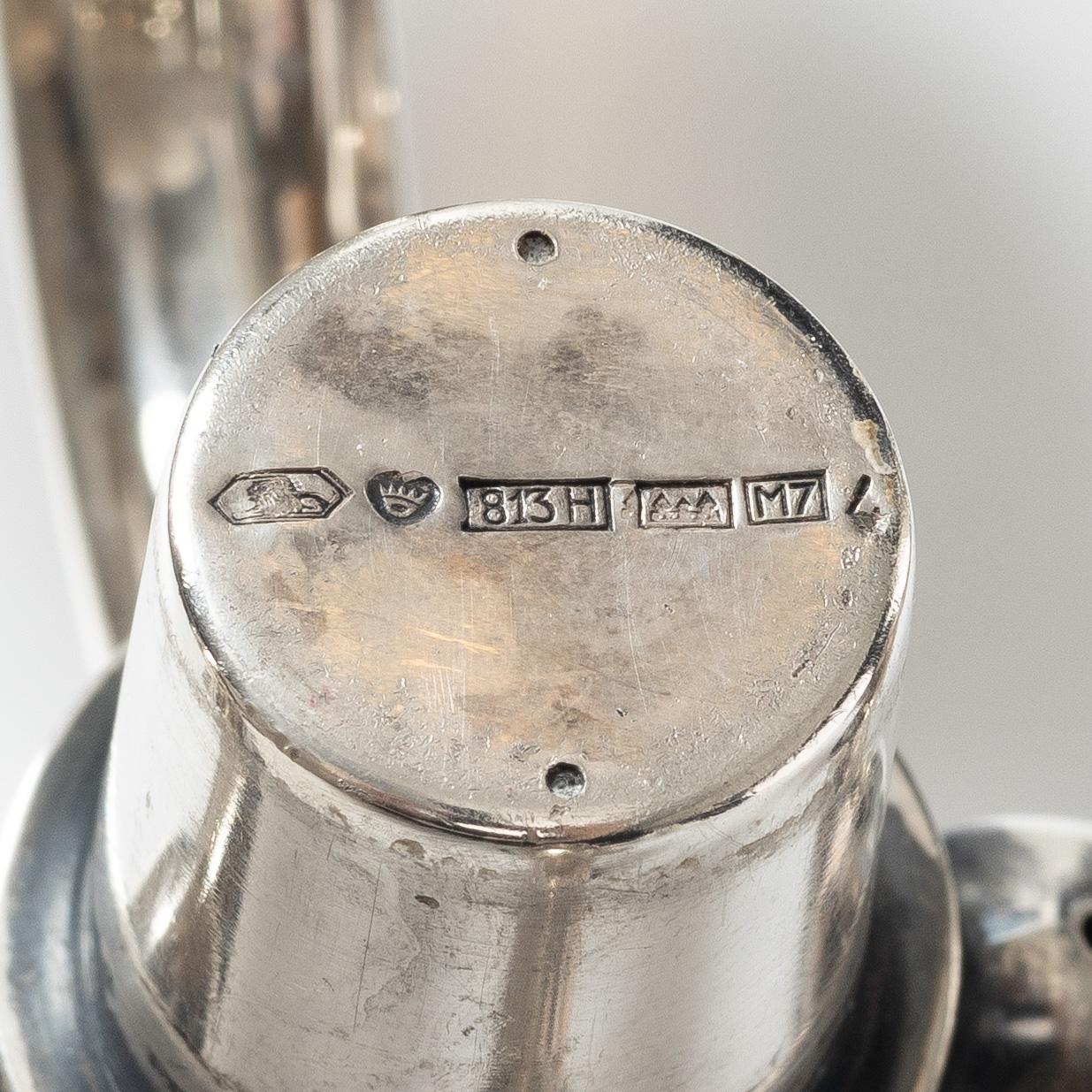 A silver candelabrum, marks of Kultakeskus Oy, Hämeenlinna, Finland 1965.