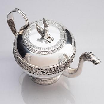 A silver pitcher with lid, unidentified maker LH, 19th century.