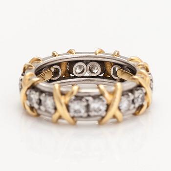 Tiffany & Co, a platinum and 18K gold 'Schlumberger' ring, with brilliant-cut diamonds.