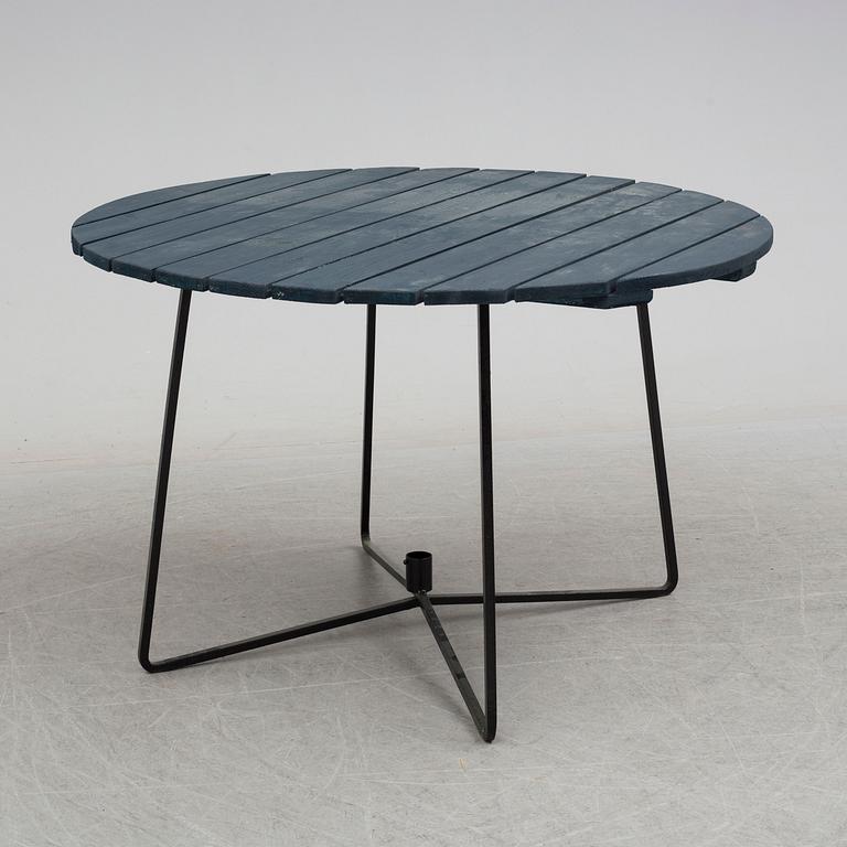 A mid 20th Century garden table from Grythyttan.