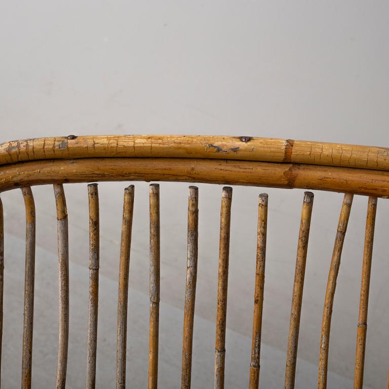 a pair of rattan easy chairs, 20th century.