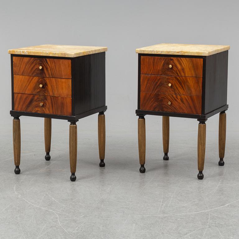 A pair of mid 20th century bedside tables.