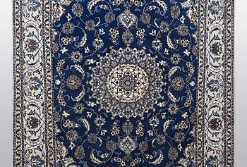 A carpet, Nain, part silk 9 LAA, ca 310 x 203 cm.