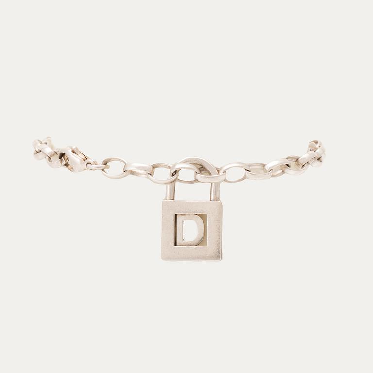 Tiffany & Co berlock silver medföljande armband.