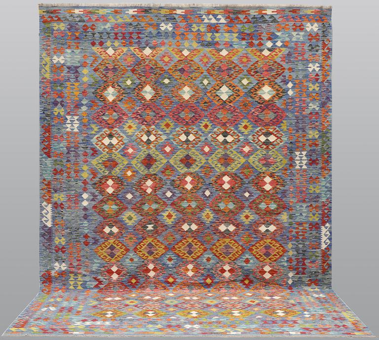 A Kilim carpet, approx. 350 x 250 cm.