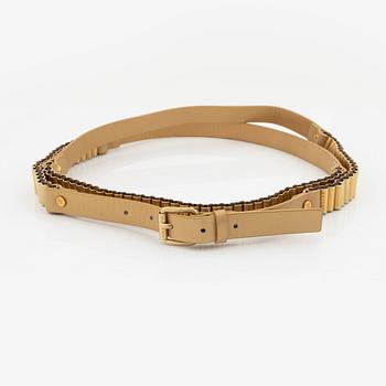 Céline, a gulden leather and metal belt, size 70.