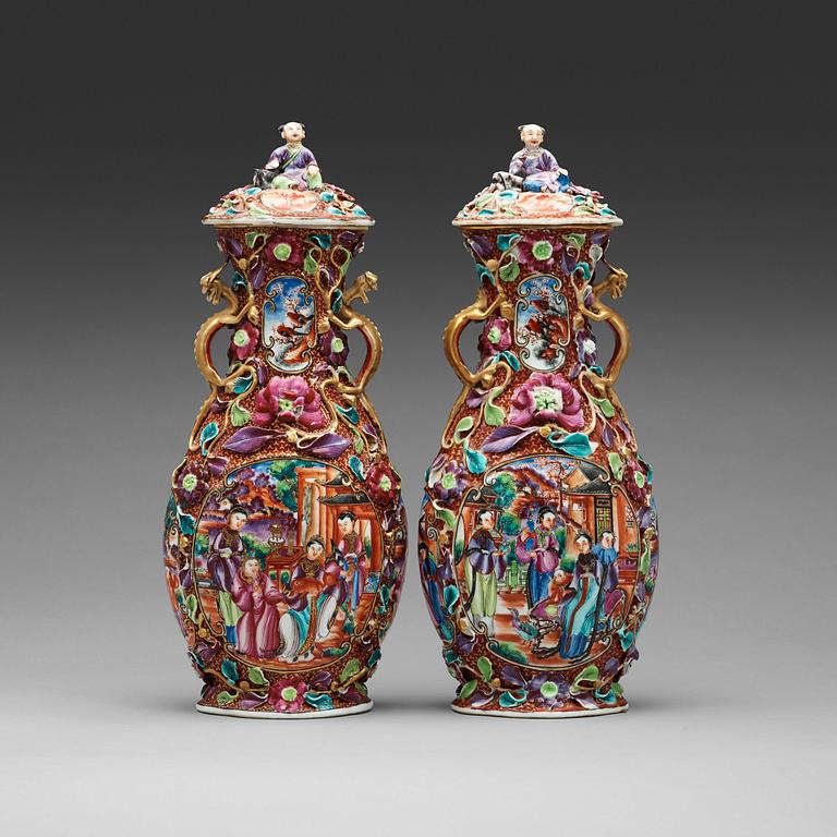 A pair of famille rose vases with covers, Qing dynasty, Qianlong (1736-95).