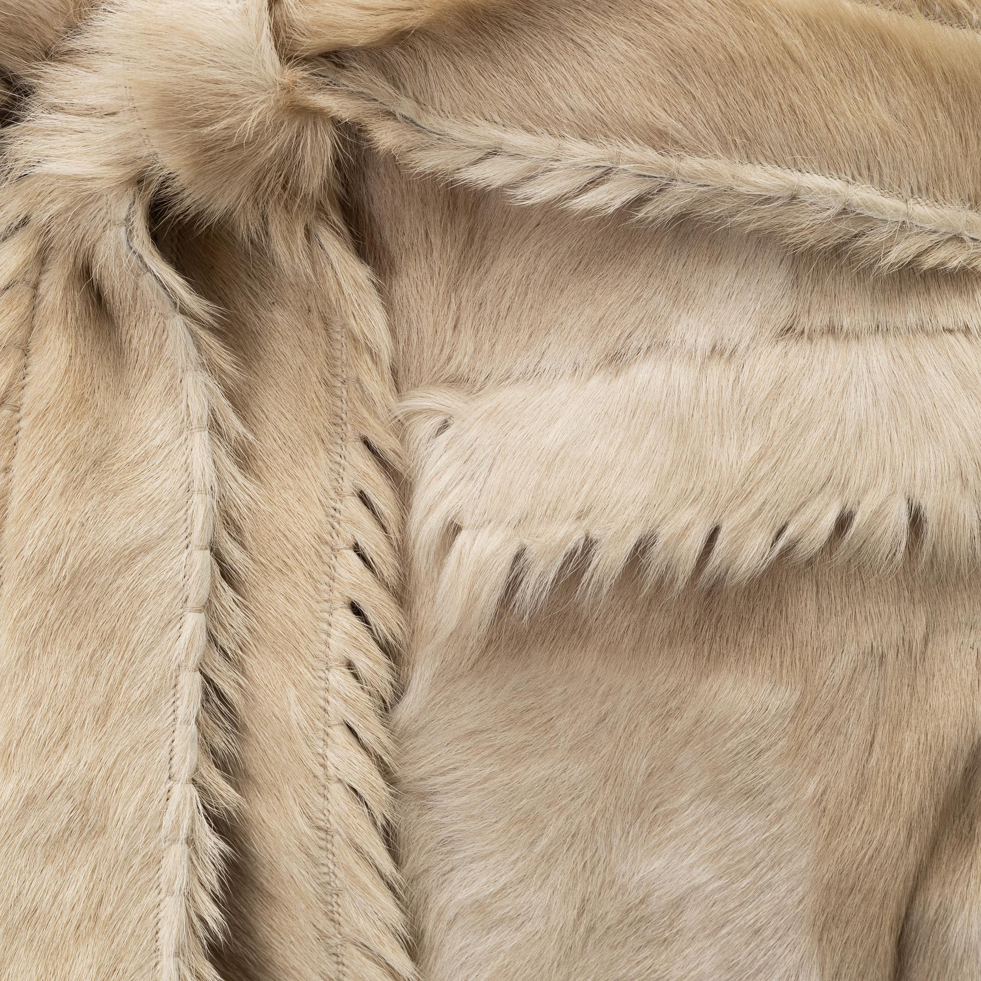 Lanvin a goat fur jacket with belt size 34. Bukowskis