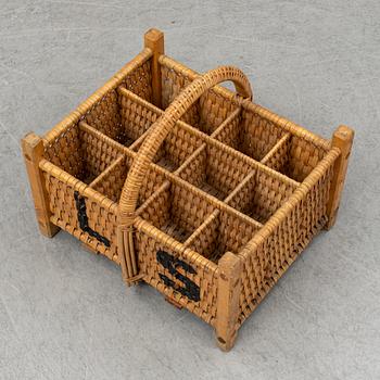 A rattan bottle basket.
