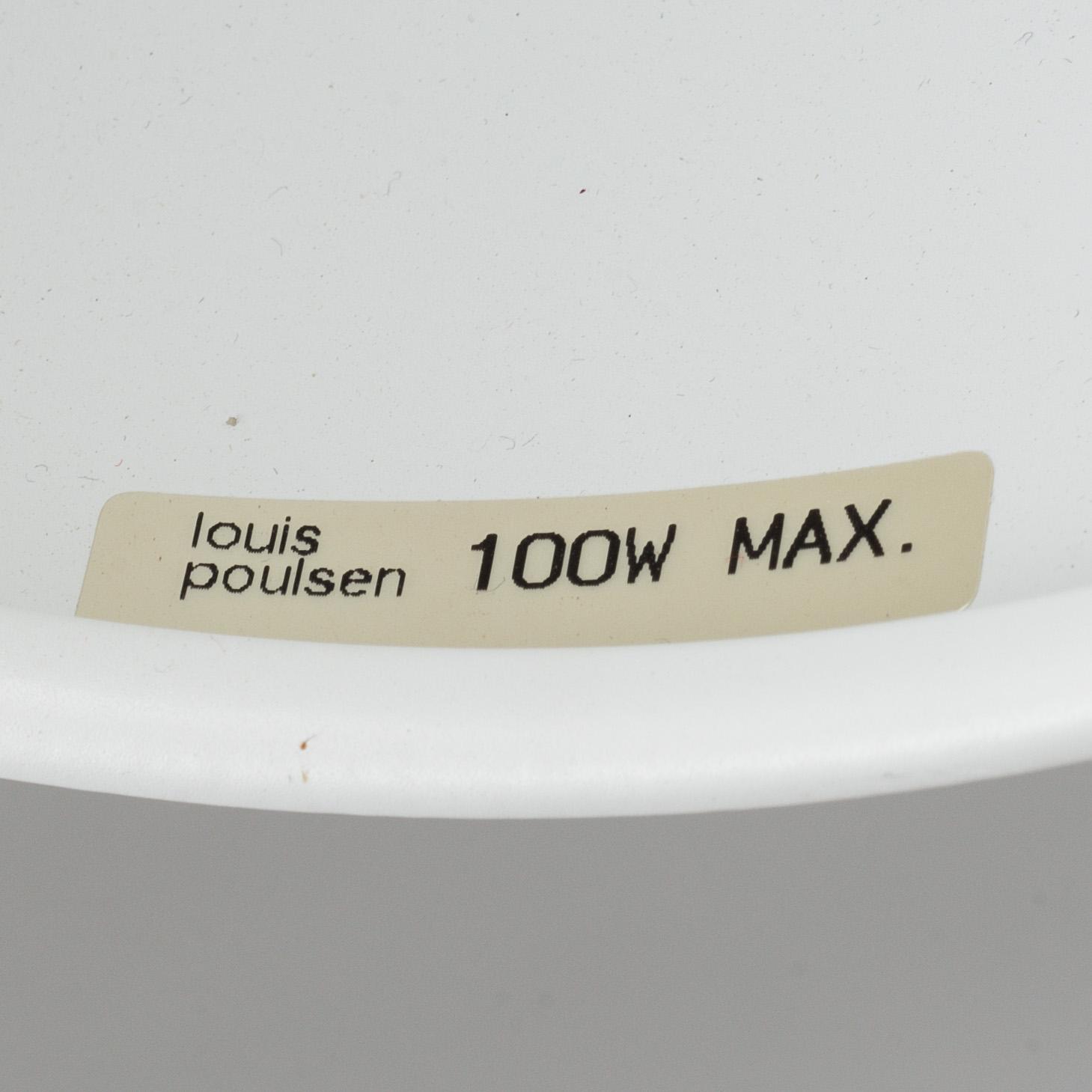 A Louis Poulsen "IT" metal writing desk light.