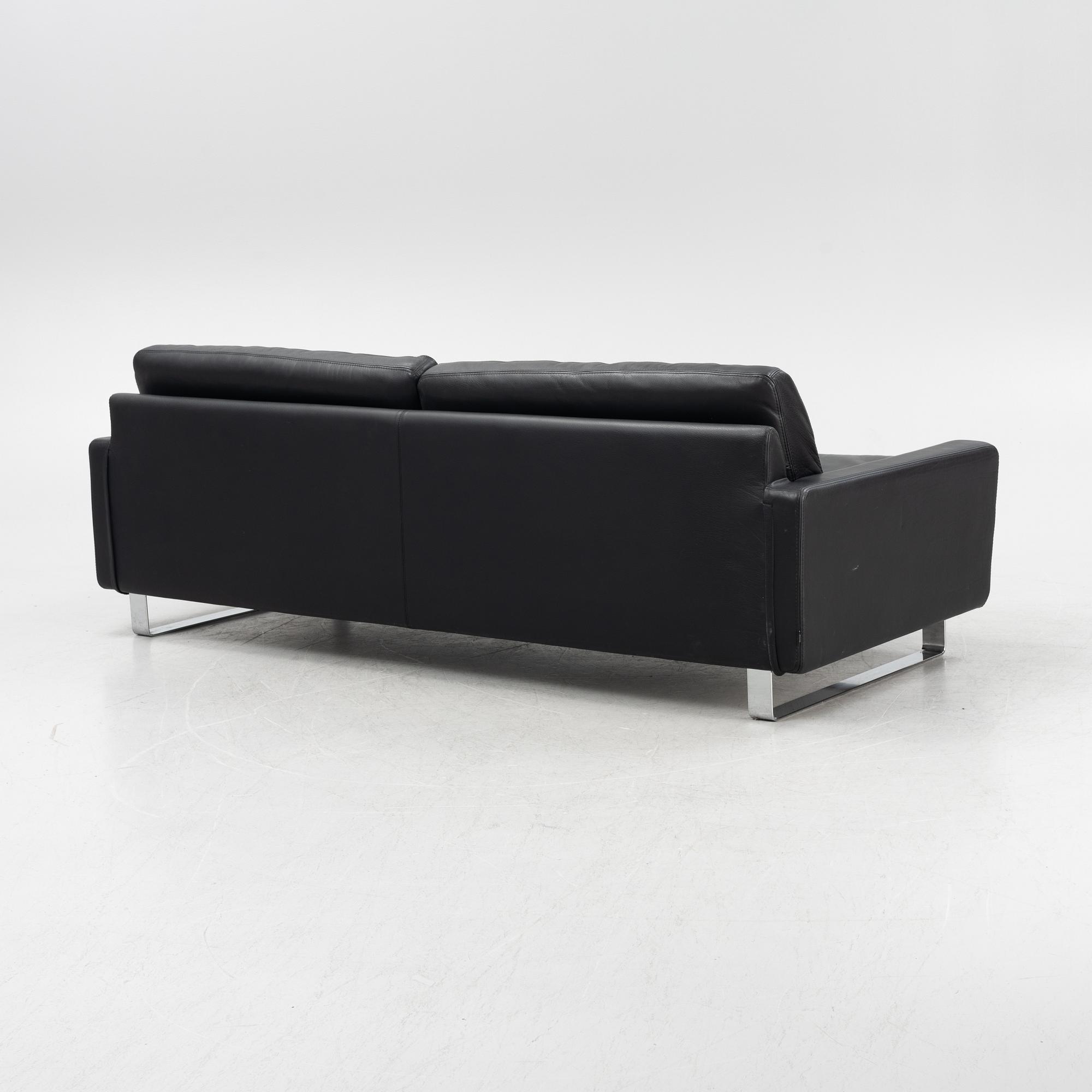 A leather upholstered sofa, Dux, 21st Century.