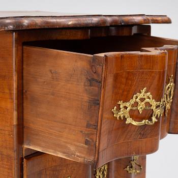 A Rococo-style chest of drawers, 19th century.