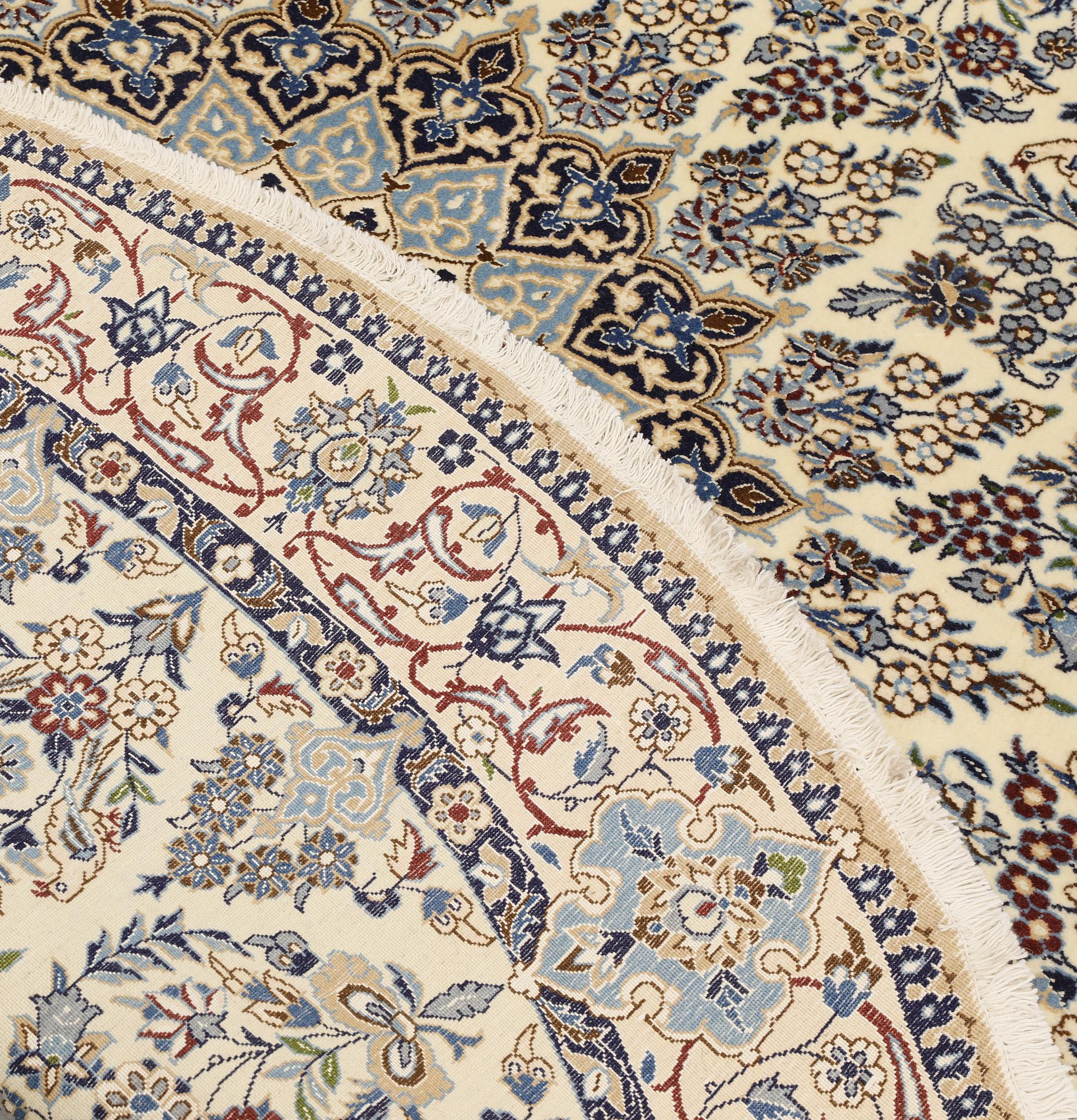 A part silk Nain rug, so called 9LAA, diameter c. 203 cm.
