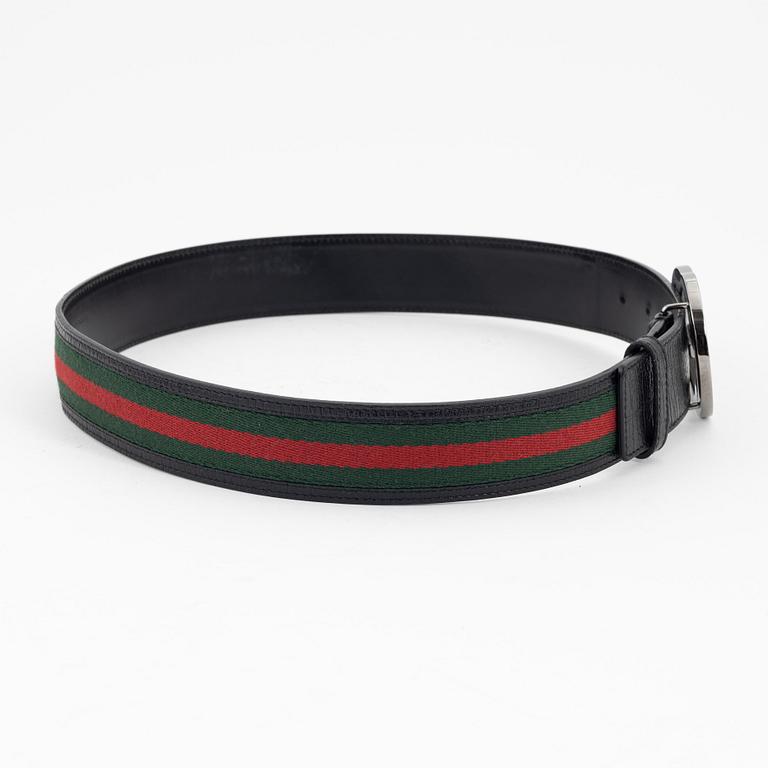 Gucci, a leather and textile belt, size 80.