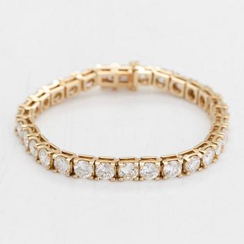 Tennisarmband, 14K guld med briljantslipade diamanter totalt ca 12.00 ct.