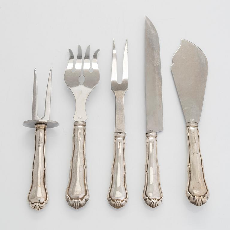 A 47-piece set of 'Chippendale' silver cutlery and a pair of silver candlesticks, Finnish marks 1983-2003 and 1976.