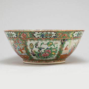 A famille rose 'Canton' punch bowl, Qing dynasty, late 19th century.