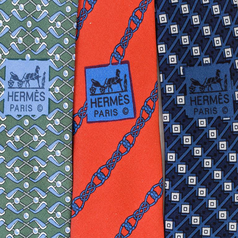 Three silk ties from Hermès.