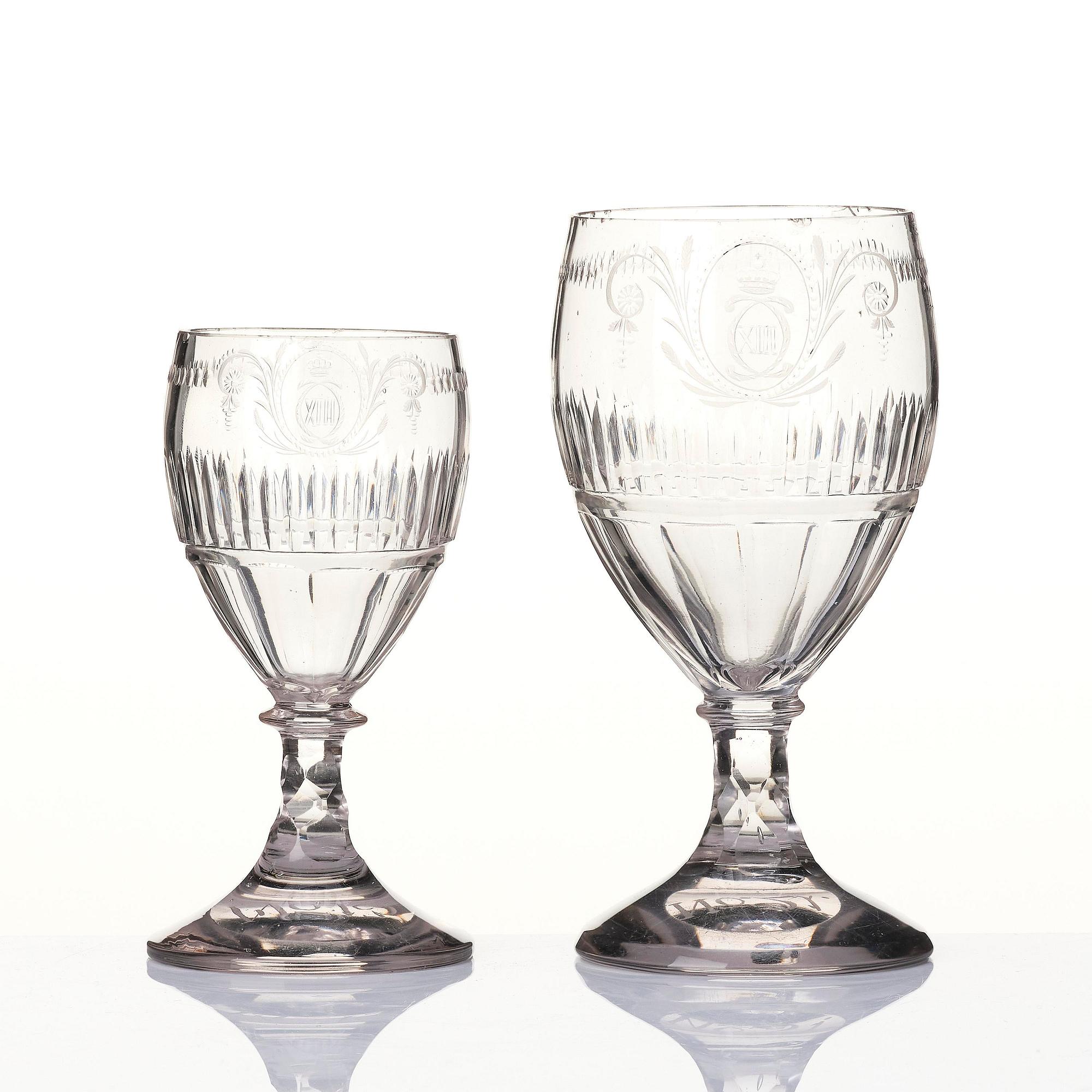 A 12 part glass service engraved by Anders Spolander, with the monogram of Carolus XIII, Reijmyre Sweden, 1810’s.